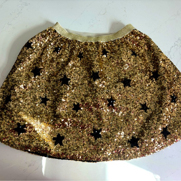 EUC Crewcuts Gold sequin skirt with black stars size L - Picture 1 of 3